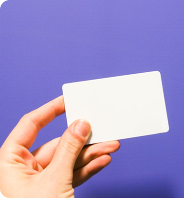 Hand holding a health screening card